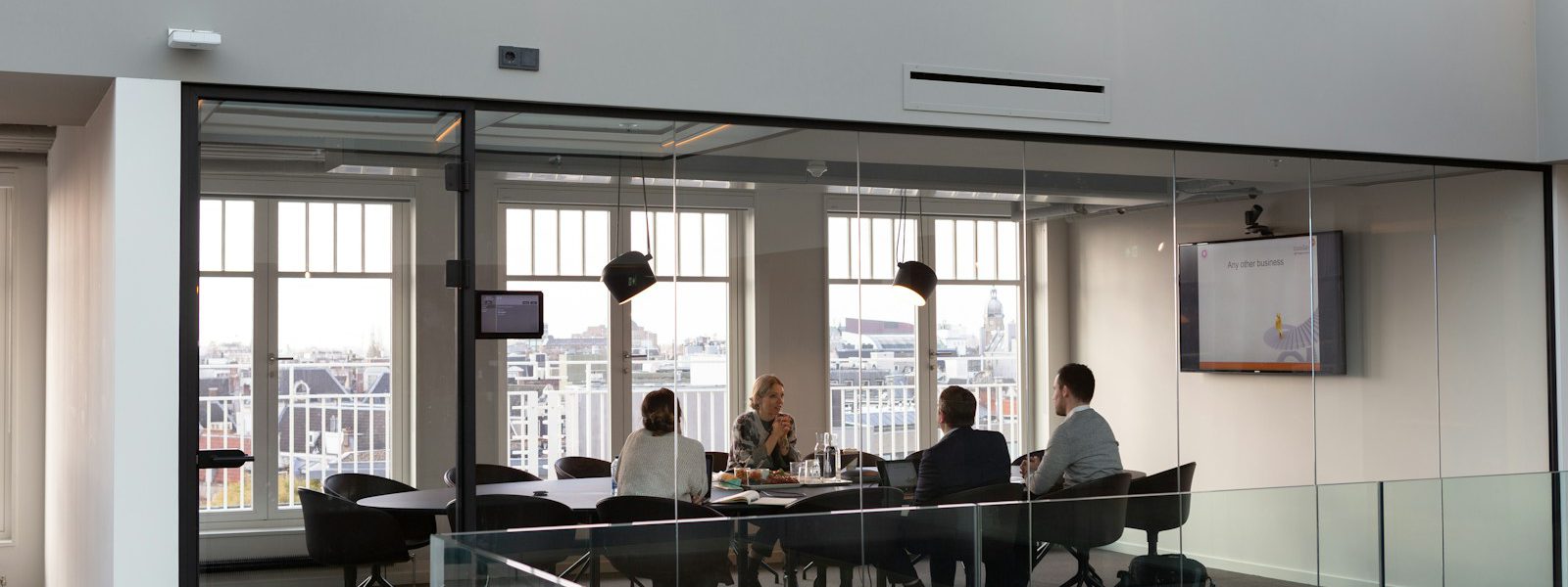 people sitting on chair inside building